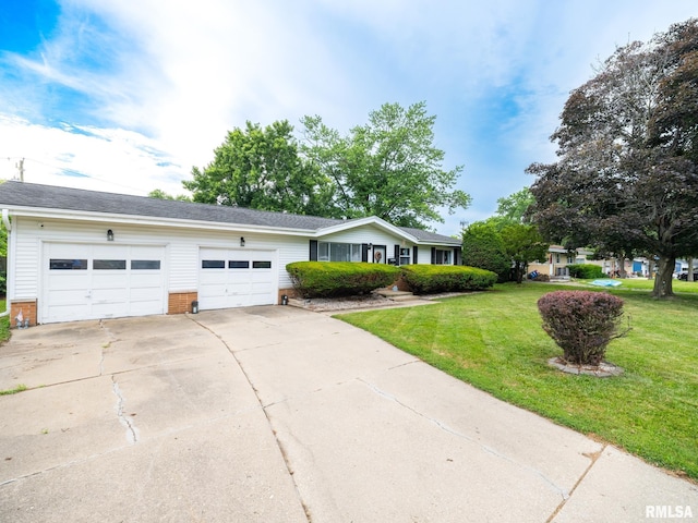 1600 W Willcox Ave, Peoria, IL 61604 - ranch-style house featuring a garage, driveway, a front lawn, and brick siding