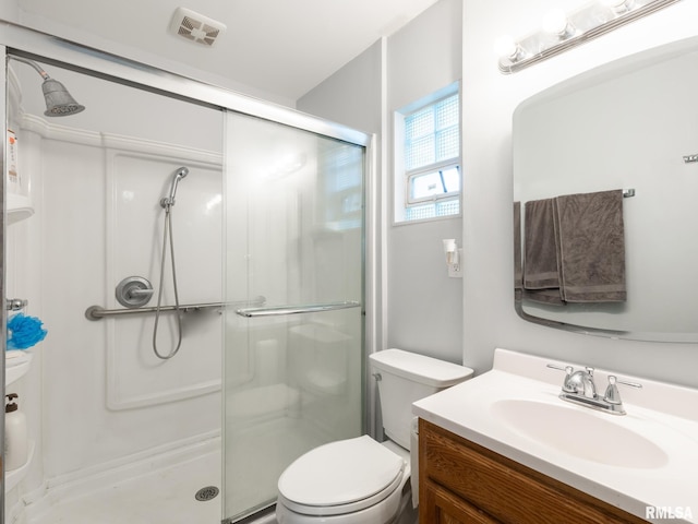 1600 W Willcox Ave, Peoria, IL 61604 - bathroom featuring a shower stall and vanity
