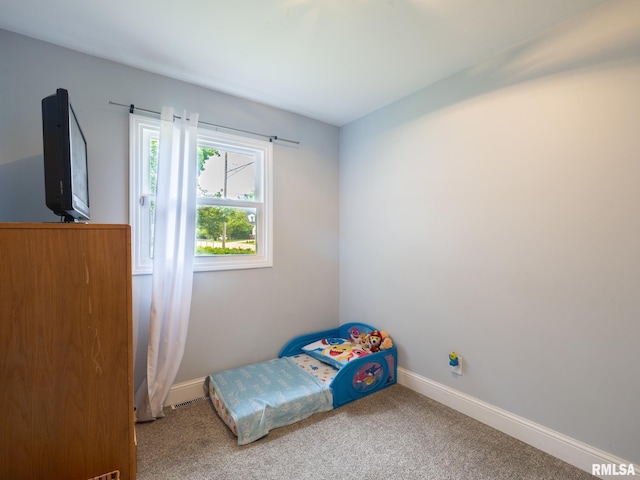 1600 W Willcox Ave, Peoria, IL 61604 - carpeted bedroom featuring baseboards