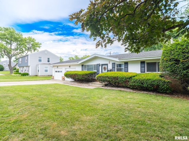 1600 W Willcox Ave, Peoria, IL 61604 - single story home featuring a garage, concrete driveway, and a front lawn