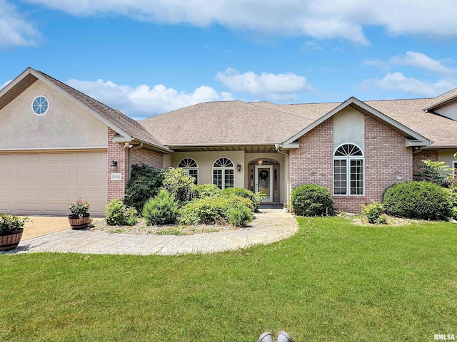 11801 N Deerfield Dr, Dunlap, IL 61525 - single story home with brick siding, a front lawn, a garage, and roof with shingles