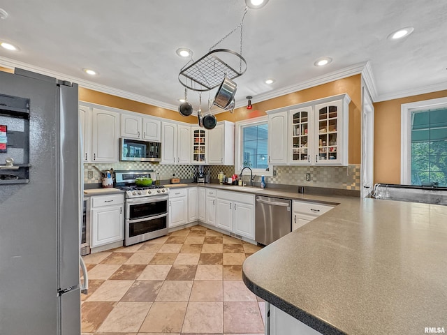 11801 N Deerfield Dr, Dunlap, IL 61525 - kitchen featuring stainless steel appliances, decorative backsplash, ornamental molding, white cabinets, and glass insert cabinets