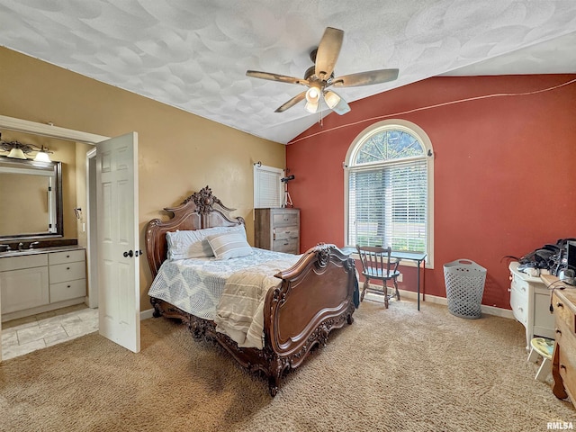 11801 N Deerfield Dr, Dunlap, IL 61525 - bedroom featuring carpet, vaulted ceiling, ceiling fan, and connected bathroom