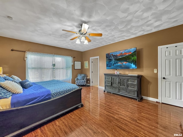 11801 N Deerfield Dr, Dunlap, IL 61525 - bedroom with wood finished floors and a ceiling fan