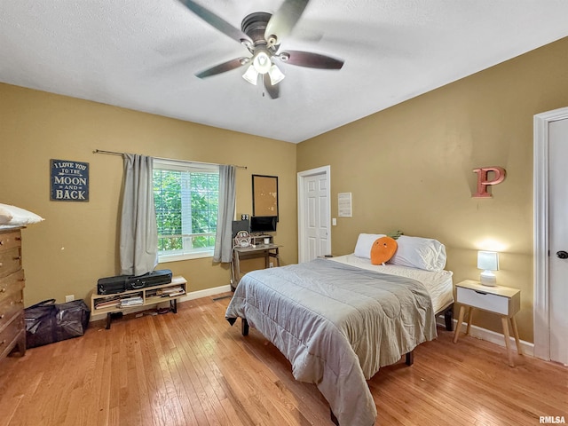 11801 N Deerfield Dr, Dunlap, IL 61525 - bedroom featuring light wood finished floors and a ceiling fan
