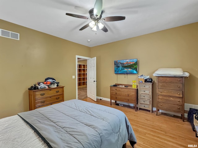 11801 N Deerfield Dr, Dunlap, IL 61525 - bedroom with light wood-style flooring and a ceiling fan