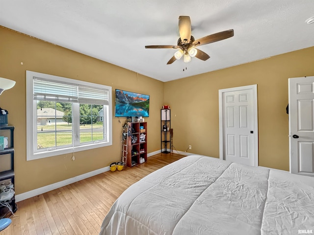 11801 N Deerfield Dr, Dunlap, IL 61525 - bedroom with hardwood / wood-style floors and a ceiling fan