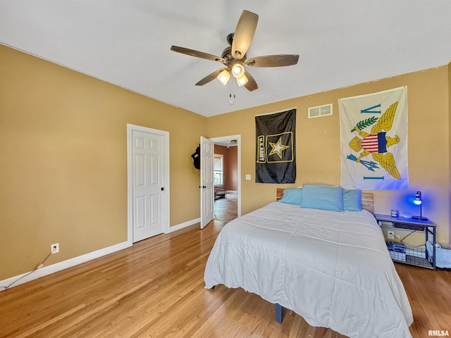 11801 N Deerfield Dr, Dunlap, IL 61525 - bedroom with wood finished floors and ceiling fan