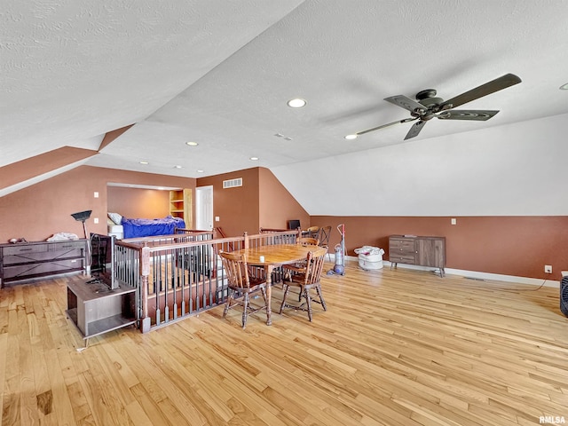 11801 N Deerfield Dr, Dunlap, IL 61525 - additional living space featuring vaulted ceiling, wood-type flooring, a textured ceiling, ceiling fan, and recessed lighting
