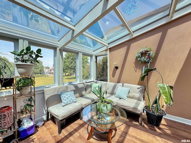 11801 N Deerfield Dr, Dunlap, IL 61525 - sunroom with a skylight, wood finished floors, healthy amount of natural light, and vaulted ceiling
