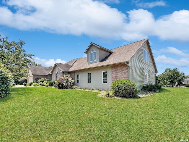 11801 N Deerfield Dr, Dunlap, IL 61525 - view of property exterior featuring a yard and roof with shingles