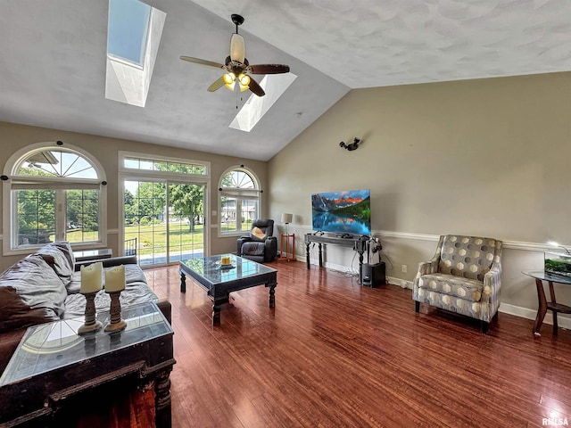 11801 N Deerfield Dr, Dunlap, IL 61525 - living room featuring a skylight, wood finished floors, a ceiling fan, plenty of natural light, and high vaulted ceiling