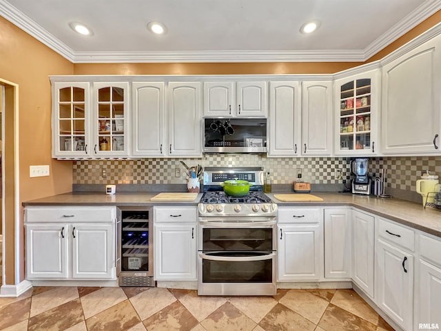 11801 N Deerfield Dr, Dunlap, IL 61525 - kitchen with stainless steel appliances, wine cooler, crown molding, white cabinets, and glass insert cabinets