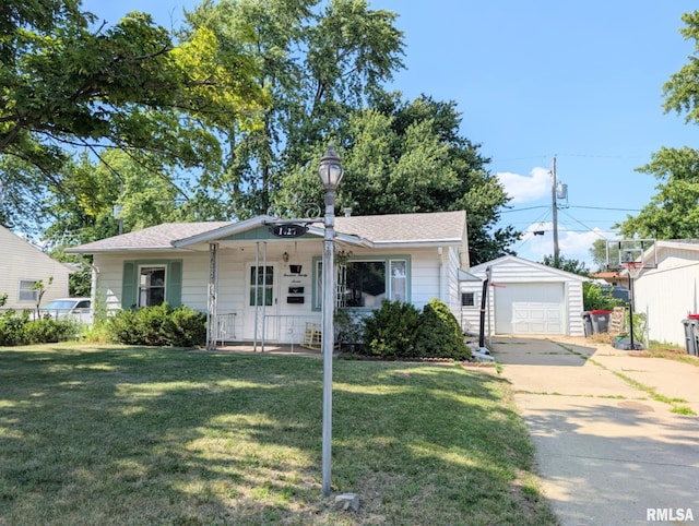 1427 Matilda St, Pekin, IL 61554 - view of front of home featuring an outbuilding, a front lawn, a garage, covered porch, and concrete driveway