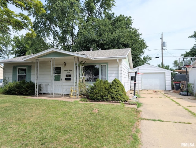 1427 Matilda St, Pekin, IL 61554 - view of front of property with a front lawn, an outbuilding, concrete driveway, a garage, and a porch