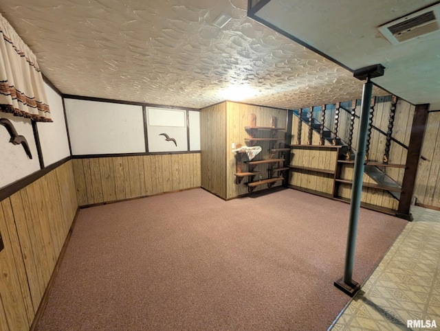 1427 Matilda St, Pekin, IL 61554 - finished basement with wooden walls, stairs, wainscoting, and carpet floors