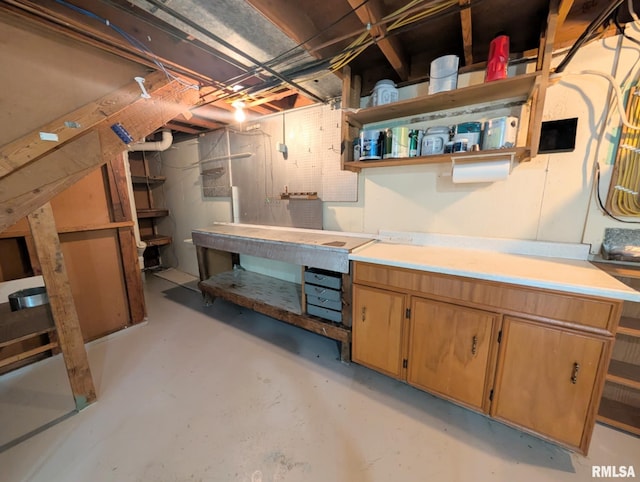 1427 Matilda St, Pekin, IL 61554 - unfinished below grade area featuring a workshop area