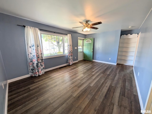 1427 Matilda St, Pekin, IL 61554 - unfurnished room with dark wood-style floors and ceiling fan