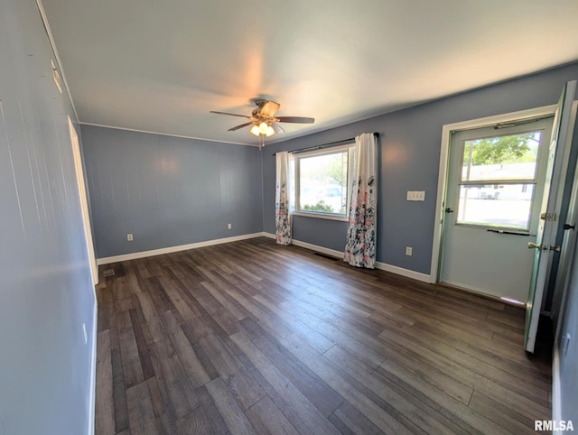 1427 Matilda St, Pekin, IL 61554 - empty room with a ceiling fan and dark wood-style floors