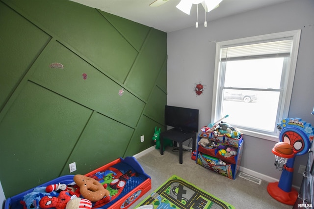 1825 Holiday Dr, Pekin, IL 61554 - playroom featuring healthy amount of natural light, carpet floors, and ceiling fan