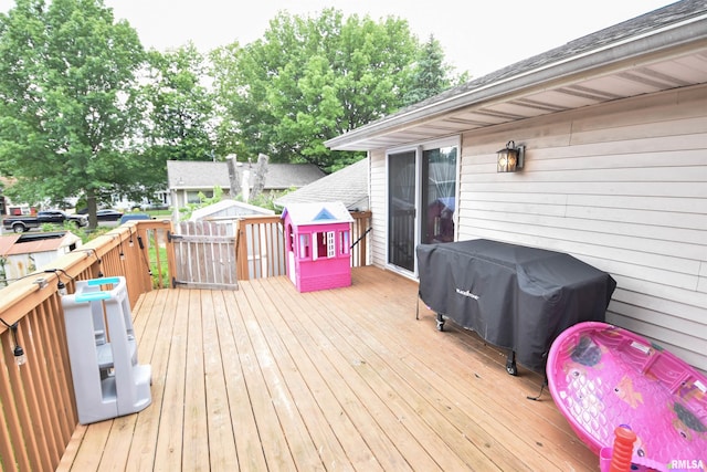 1825 Holiday Dr, Pekin, IL 61554 - wooden terrace featuring a grill and a storage shed