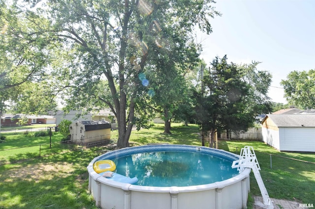 1825 Holiday Dr, Pekin, IL 61554 - view of pool featuring a storage unit and a hot tub