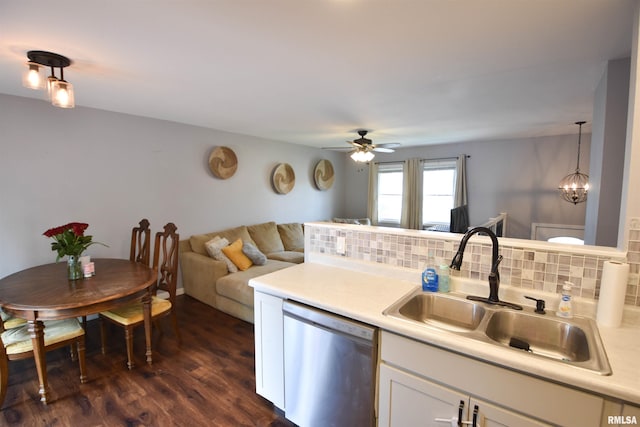 1825 Holiday Dr, Pekin, IL 61554 - kitchen with dishwasher, open floor plan, light countertops, and white cabinets