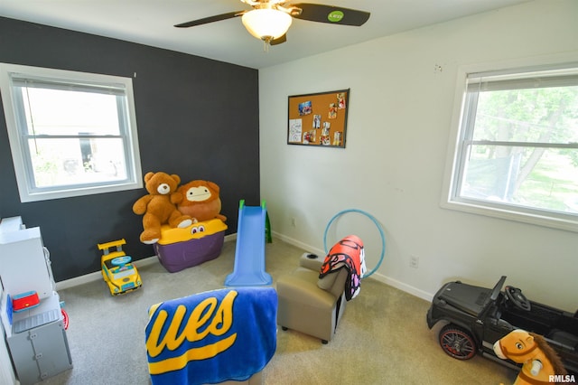 1825 Holiday Dr, Pekin, IL 61554 - recreation room featuring a ceiling fan and carpet floors