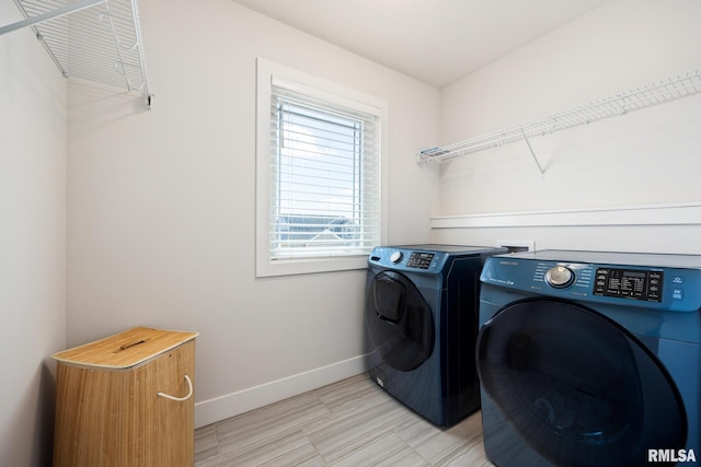2821 W Lake Trail Ct, Dunlap, IL 61525 - laundry area with washer and dryer and baseboards