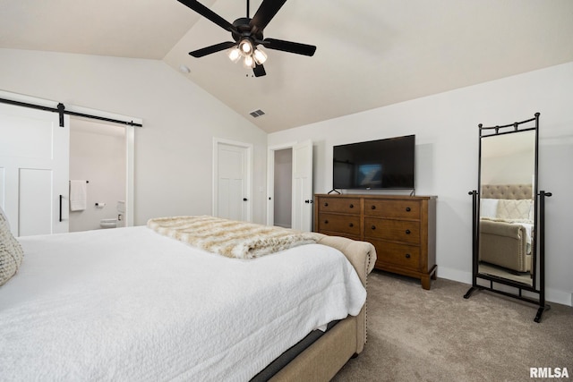 2821 W Lake Trail Ct, Dunlap, IL 61525 - bedroom with vaulted ceiling, a barn door, light carpet, connected bathroom, and ceiling fan