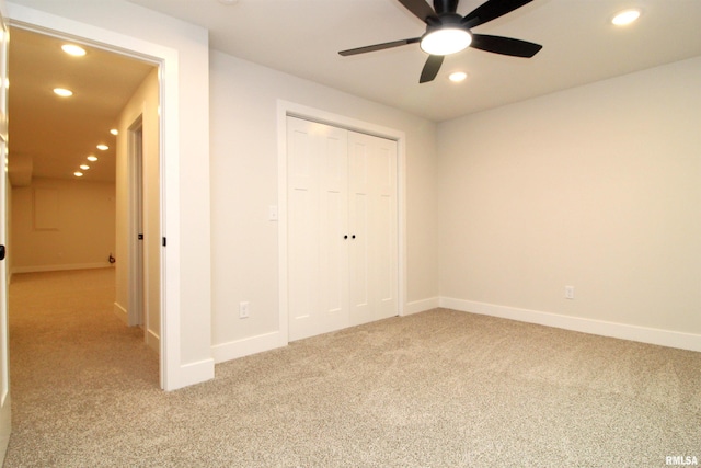 2821 W Lake Trail Ct, Dunlap, IL 61525 - unfurnished bedroom featuring light colored carpet, recessed lighting, a closet, and a ceiling fan