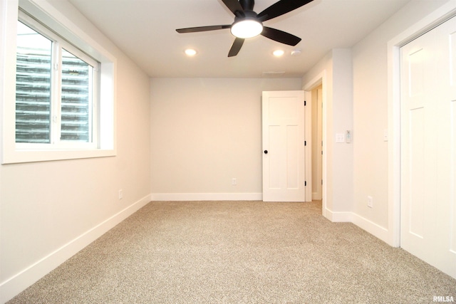 2821 W Lake Trail Ct, Dunlap, IL 61525 - spare room with light carpet, ceiling fan, and recessed lighting