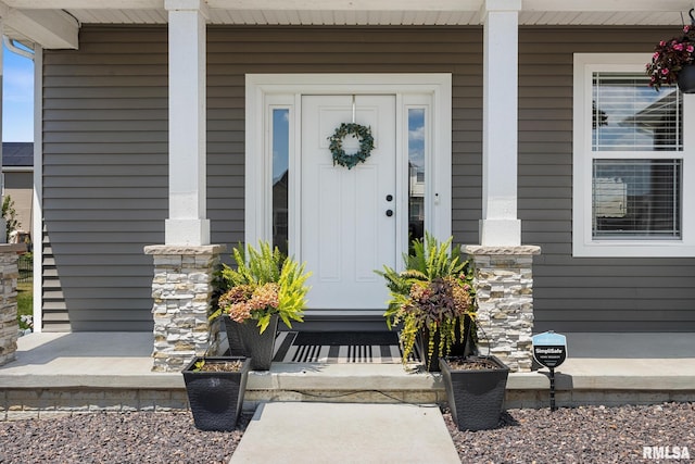 2821 W Lake Trail Ct, Dunlap, IL 61525 - doorway to property with a porch