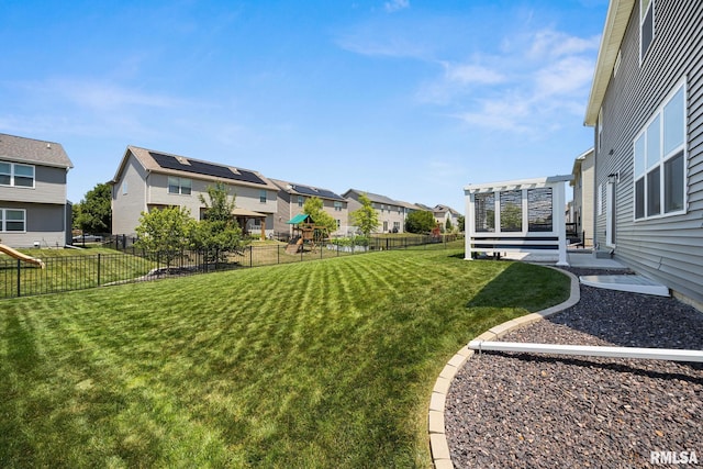 2821 W Lake Trail Ct, Dunlap, IL 61525 - fenced backyard featuring a residential view and a playground