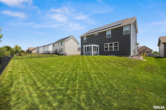 2821 W Lake Trail Ct, Dunlap, IL 61525 - rear view of house featuring roof mounted solar panels