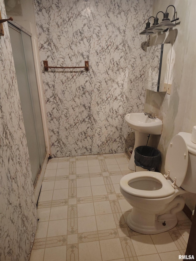 1340 E Ash St, Canton, IL 61520 - full bathroom with a stall shower and wallpapered walls