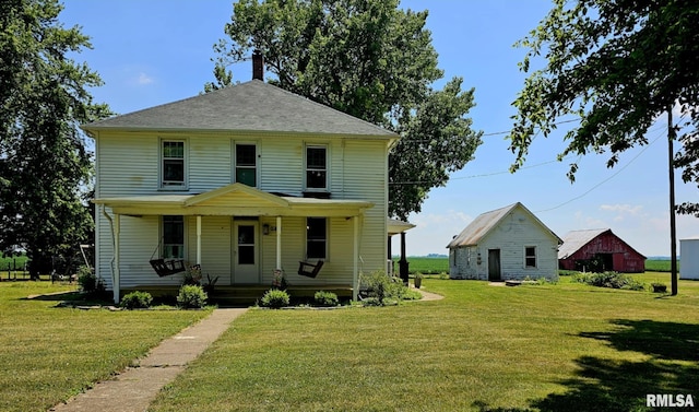 1469 2100th St, Lincoln, IL 62656 - view of front of property with a chimney, a front lawn, and covered porch