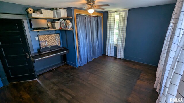 1469 2100th St, Lincoln, IL 62656 - unfurnished dining area featuring ceiling fan and wood finished floors