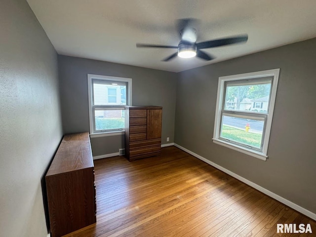 4107 N Hollyridge Cir, Peoria, IL 61614 - empty room with hardwood / wood-style flooring and ceiling fan
