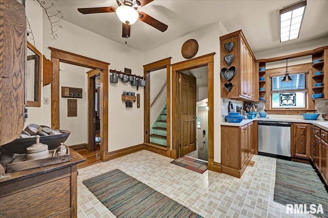 213 S Hanover St, Metamora, IL 61548 - kitchen with stainless steel dishwasher, open shelves, ceiling fan, brown cabinetry, and brick patterned flooring