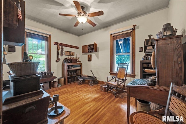 213 S Hanover St, Metamora, IL 61548 - office area featuring ceiling fan and wood finished floors