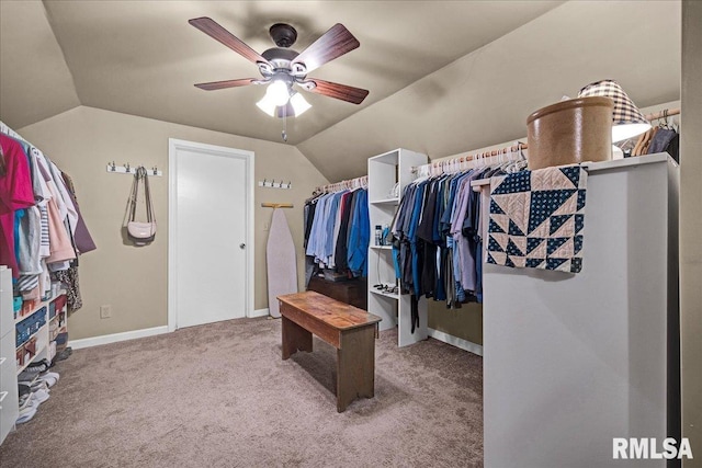 213 S Hanover St, Metamora, IL 61548 - walk in closet with vaulted ceiling, a ceiling fan, and carpet floors