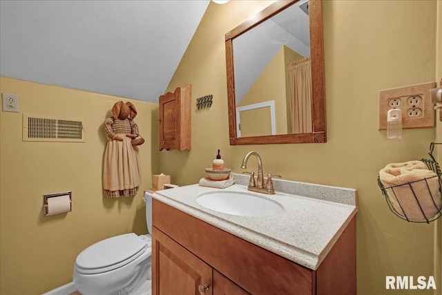 213 S Hanover St, Metamora, IL 61548 - bathroom with vanity and vaulted ceiling