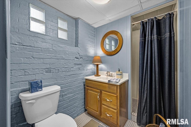 213 S Hanover St, Metamora, IL 61548 - full bathroom with vanity, tile patterned floors, and a shower with curtain
