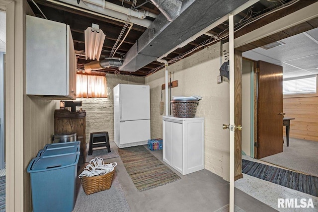 213 S Hanover St, Metamora, IL 61548 - basement with freestanding refrigerator and plenty of natural light