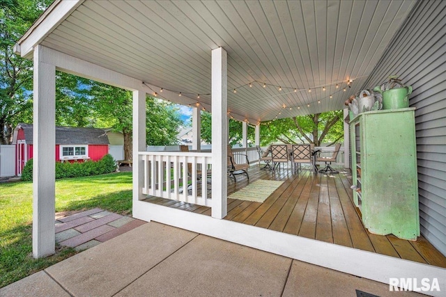 213 S Hanover St, Metamora, IL 61548 - wooden terrace featuring an outdoor structure