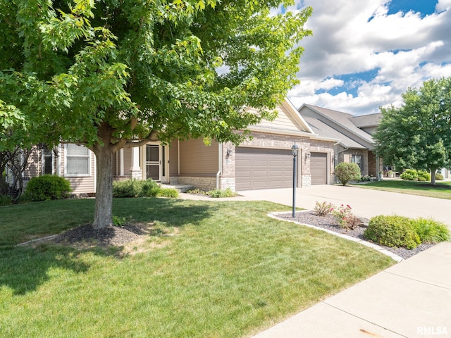 11014 N Saddlehorn Way, Dunlap, IL 61525 - view of front of property with an attached garage, concrete driveway, and a front yard