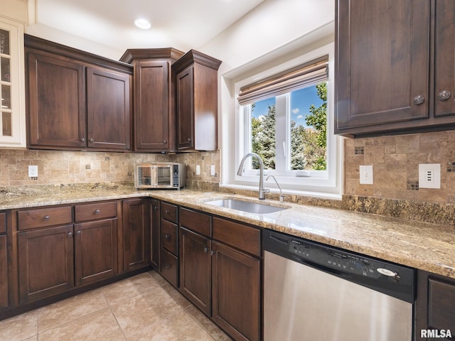 11014 N Saddlehorn Way, Dunlap, IL 61525 - kitchen featuring dishwasher, backsplash, light tile patterned flooring, light stone countertops, and recessed lighting