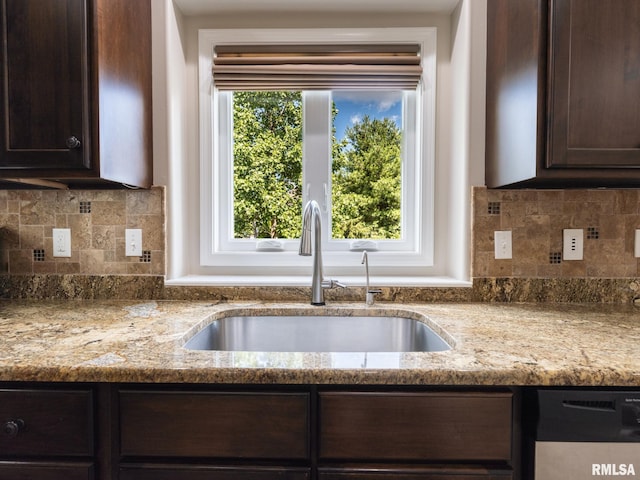 11014 N Saddlehorn Way, Dunlap, IL 61525 - kitchen with dark brown cabinetry, dishwasher, and light stone counters