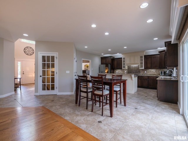 11014 N Saddlehorn Way, Dunlap, IL 61525 - dining area featuring light tile patterned floors and recessed lighting